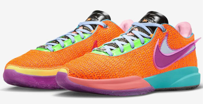 View of orange, purple, and pink Nike LeBron shoes.